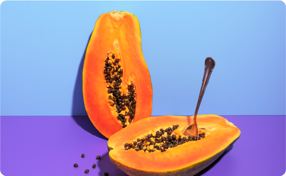 decorative image of two halves of a papaya