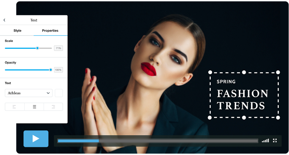 A paused fashion and beauty video shows a model with red lips and nails against a sleek, black background. The text on the video reads "Spring Fashion Trends."